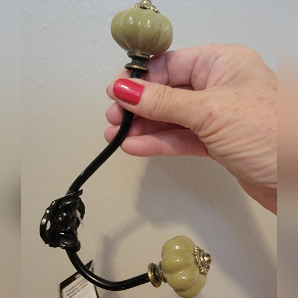 Cute NWT hook/hanger. Olive and metal.